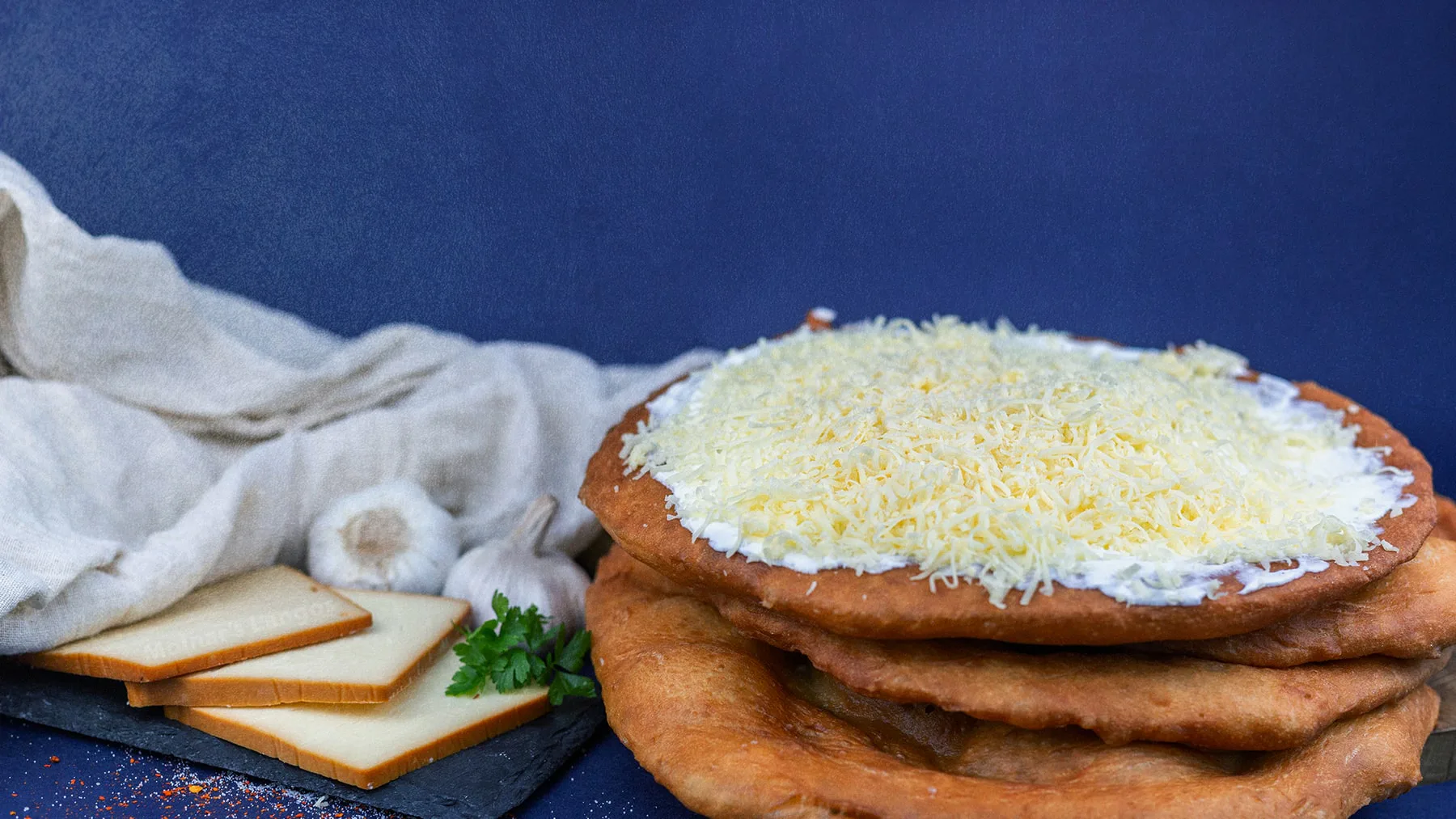 Fresh sour cream and cheese lángos at Molnár’s Lángos